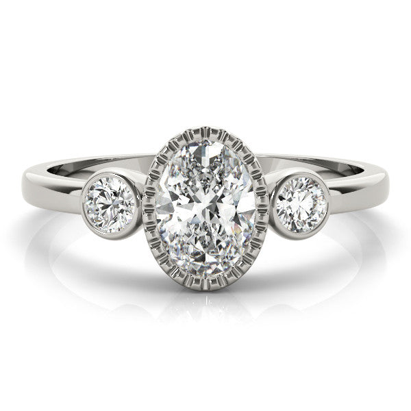 Platinum Oval Three-Stone Bezel Set Diamond Ring with Solitaire Band