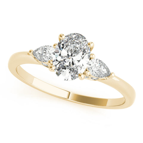 Yellow gold Oval Cut Three-Stone Diamond Ring with Pear Side Stones on a Classic Solitaire Band with Prong Setting