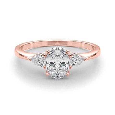 Rose gold Oval Cut Three-Stone Diamond Ring with Pear Side Stones on a Classic Solitaire Band with Prong Setting