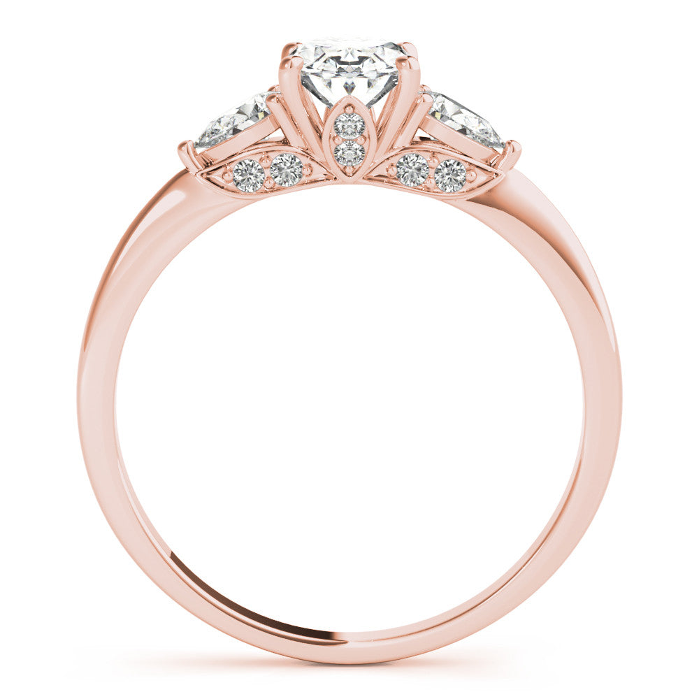 Rose gold Oval Cut Three-Stone Diamond Ring with Pear Side Stones on a Classic Solitaire Band with Prong Setting