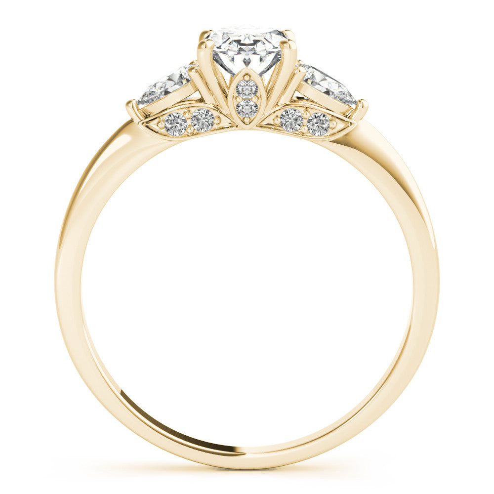 Yellow gold Oval Cut Three-Stone Diamond Ring with Pear Side Stones on a Classic Solitaire Band with Prong Setting