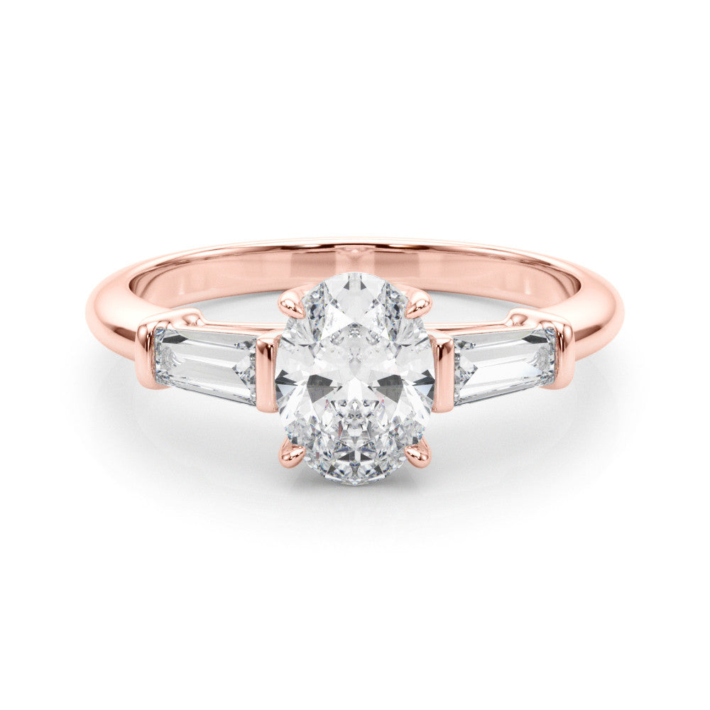 Rose gold Oval Cut Diamond Ring with Tapered Baguette Side Stones on a Platinum Band with Four-Prong Setting