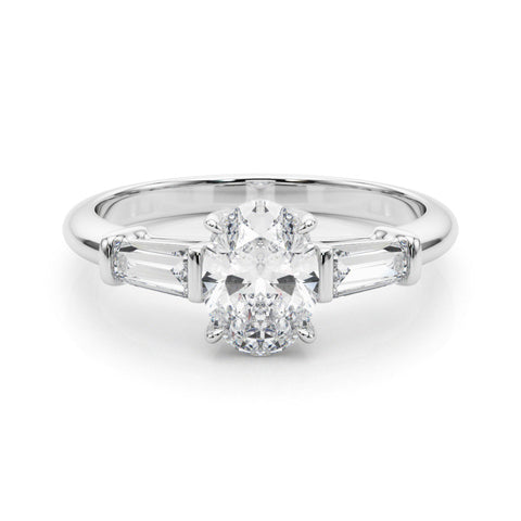 Silver Oval Cut Diamond Ring with Tapered Baguette Side Stones on a Platinum Band with Four-Prong Setting