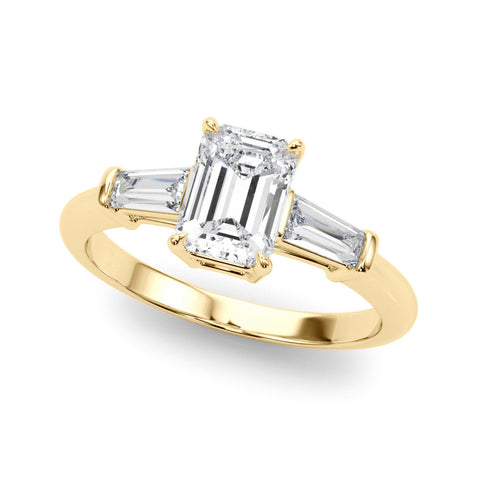 Yellow gold Marquise Cut Diamond Ring with Tapered Baguette Side Stones on a Platinum Band with Four-Prong Setting