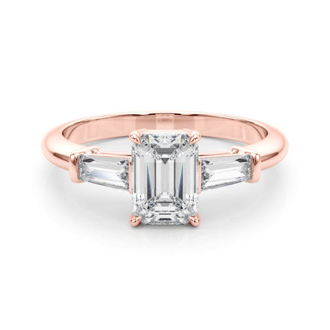 Rose gold Marquise Cut Diamond Ring with Tapered Baguette Side Stones on a Platinum Band with Four-Prong Setting