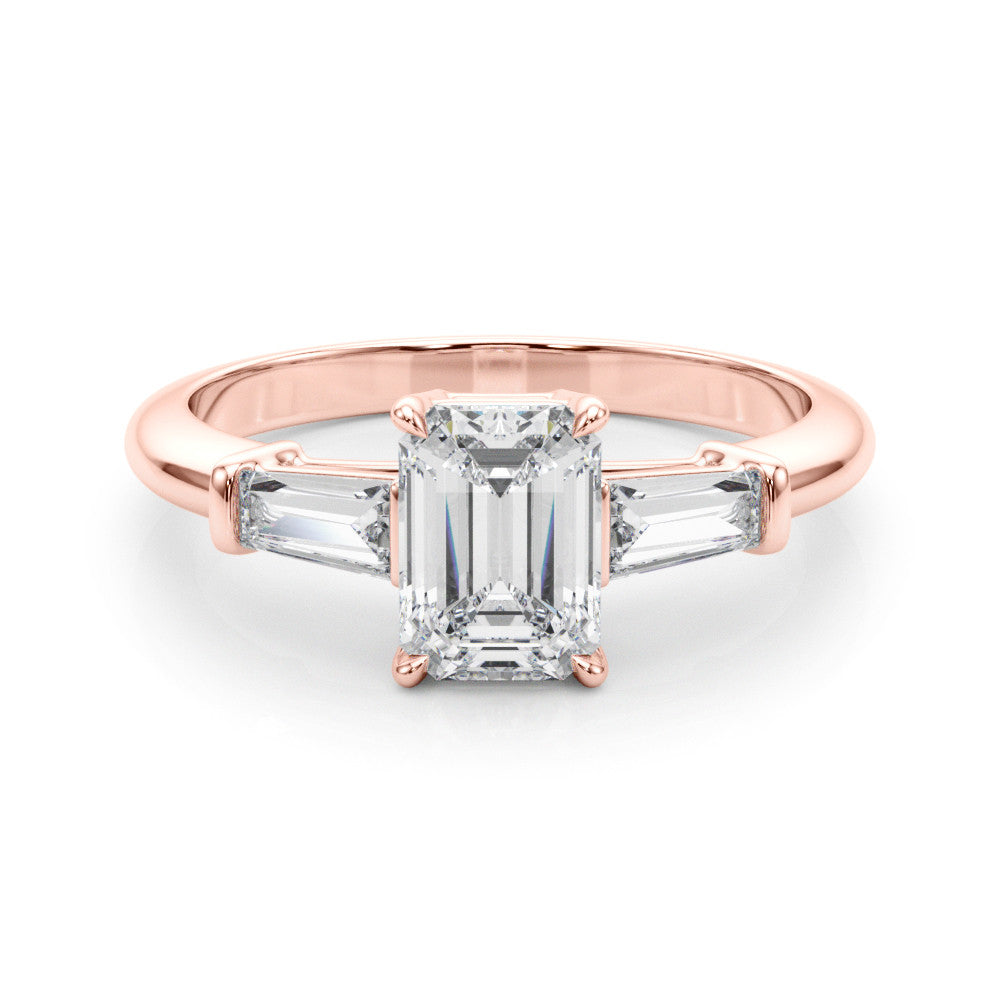 Rose gold Marquise Cut Diamond Ring with Tapered Baguette Side Stones on a Platinum Band with Four-Prong Setting