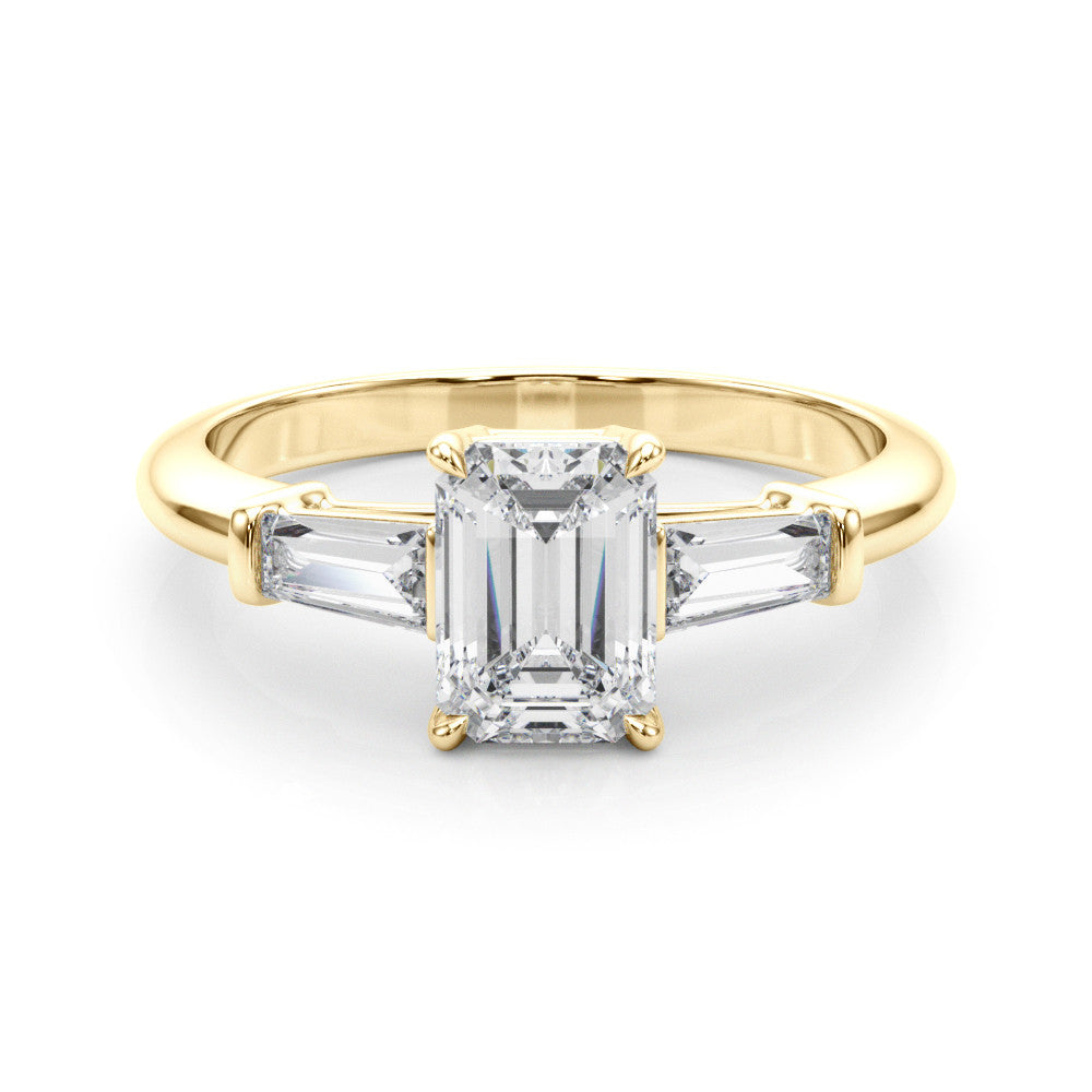 Yellow gold Cushion Cut Diamond Ring with Tapered Baguette Side Stones on a Platinum Band with Four-Prong Setting