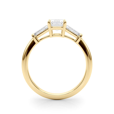 Yellow gold Marquise Cut Diamond Ring with Tapered Baguette Side Stones on a Platinum Band with Four-Prong Setting