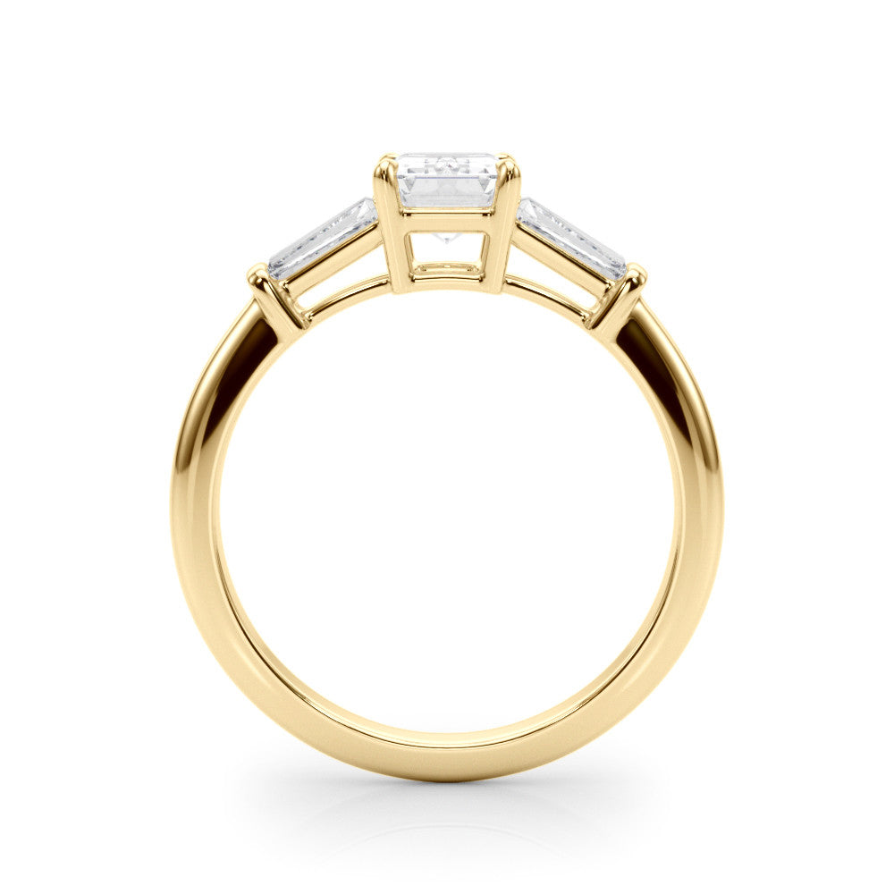 Yellow gold Cushion Cut Diamond Ring with Tapered Baguette Side Stones on a Platinum Band with Four-Prong Setting