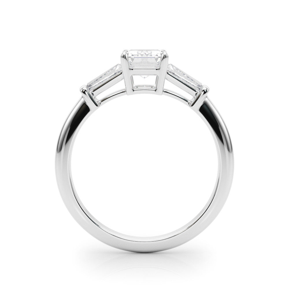 White gold Marquise Cut Diamond Ring with Tapered Baguette Side Stones on a Platinum Band with Four-Prong Setting