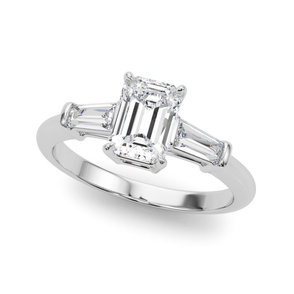 White gold Radiant Cut Diamond Ring with Tapered Baguette Side Stones on a Platinum Band with Four-Prong Setting