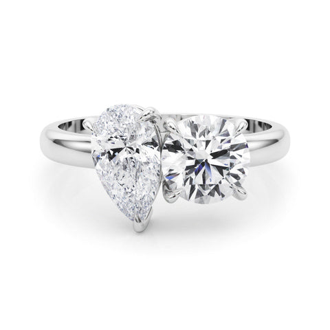 White gold Two-Stone Pear and Round Diamond Bypass Ring with Prong Setting