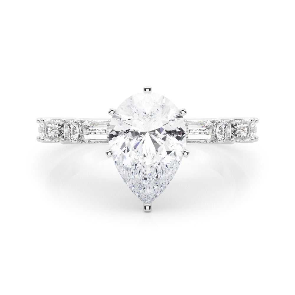 Platinum Pear Solitaire with Side Baguettes and Channel Set Band