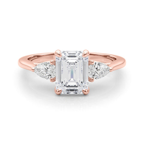Rose gold Three-Stone Marquise Cut Diamond Ring with Pear Side Stones on a Platinum Band and Four-Prong Setting