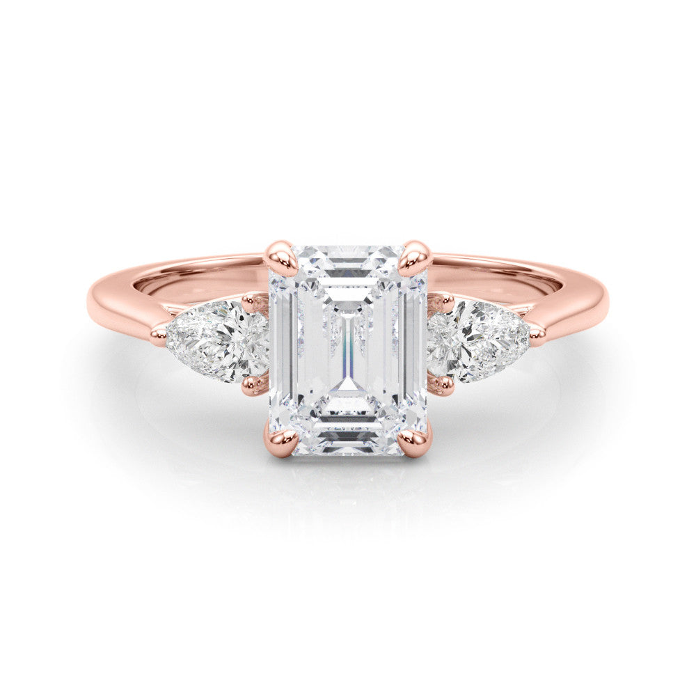 Rose gold Three-Stone Marquise Cut Diamond Ring with Pear Side Stones on a Platinum Band and Four-Prong Setting