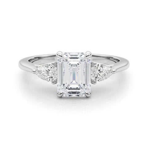White gold Three-Stone Princess Cut Diamond Ring with Pear Side Stones on a Platinum Band and Four-Prong Setting