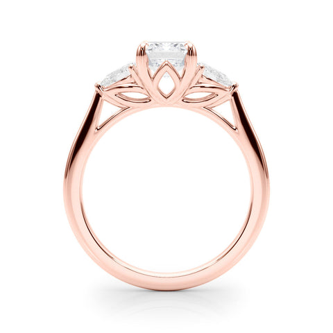 Rose gold Three-Stone Pear Cut Diamond Ring with Pear Side Stones on a Platinum Band and Four-Prong Setting