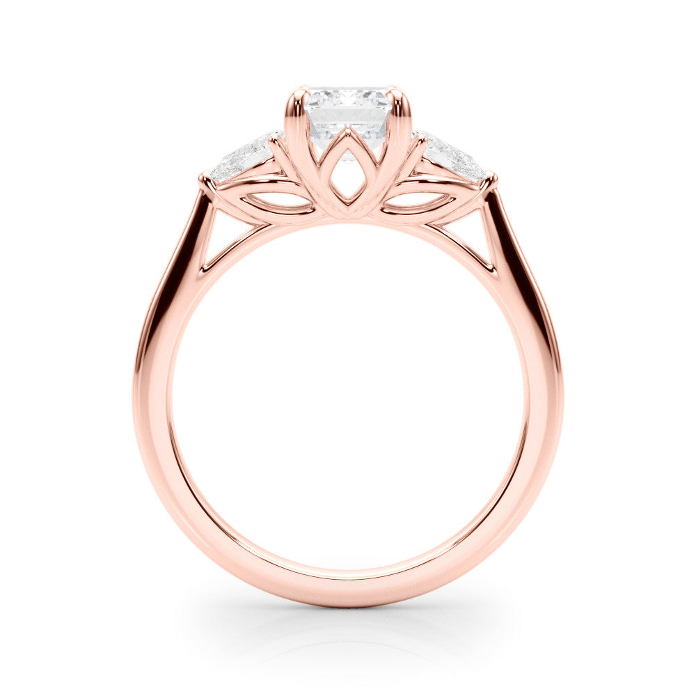 Rose gold Three-Stone Princess Cut Diamond Ring with Pear Side Stones on a Platinum Band and Four-Prong Setting
