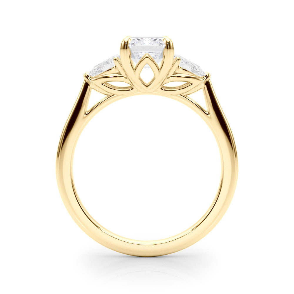 Yellow gold Three-Stone Marquise Cut Diamond Ring with Pear Side Stones on a Platinum Band and Four-Prong Setting