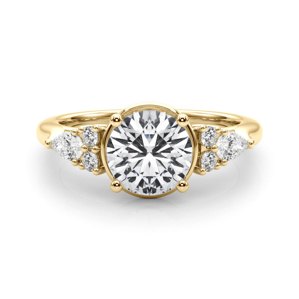Yellow gold Round Brilliant Diamond Solitaire with Side Stones on a Tapered Band and Four-Prong Setting