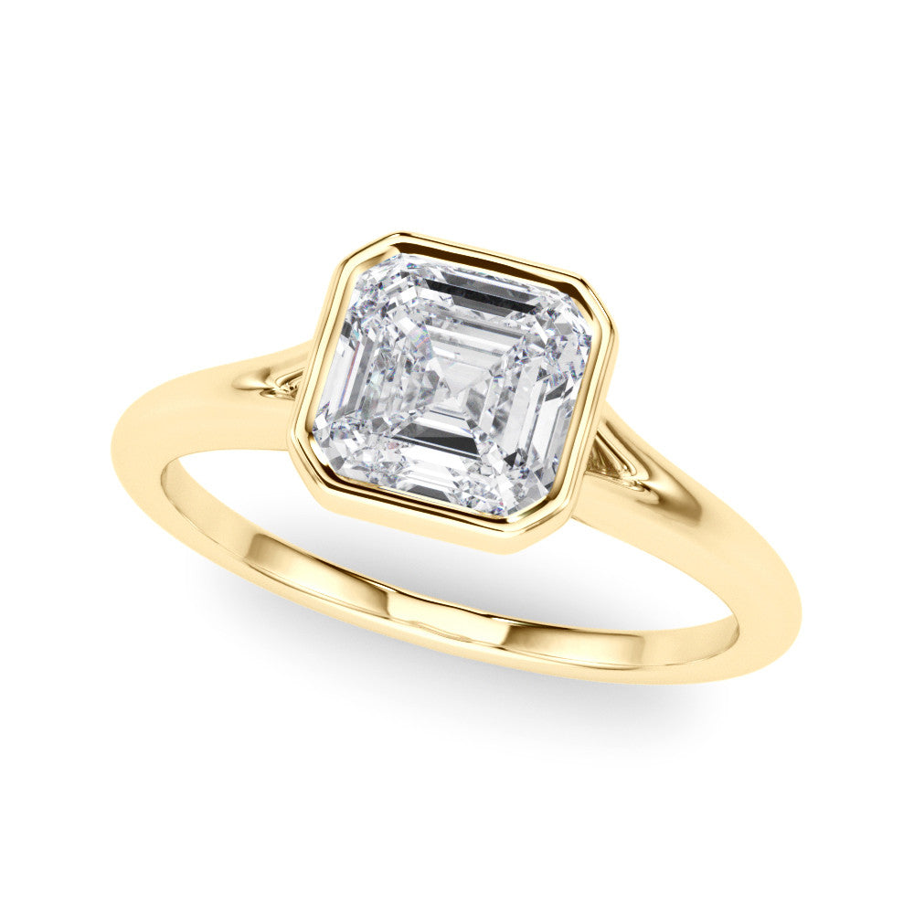 Yellow gold Bezel Set Pear Cut Solitaire Ring