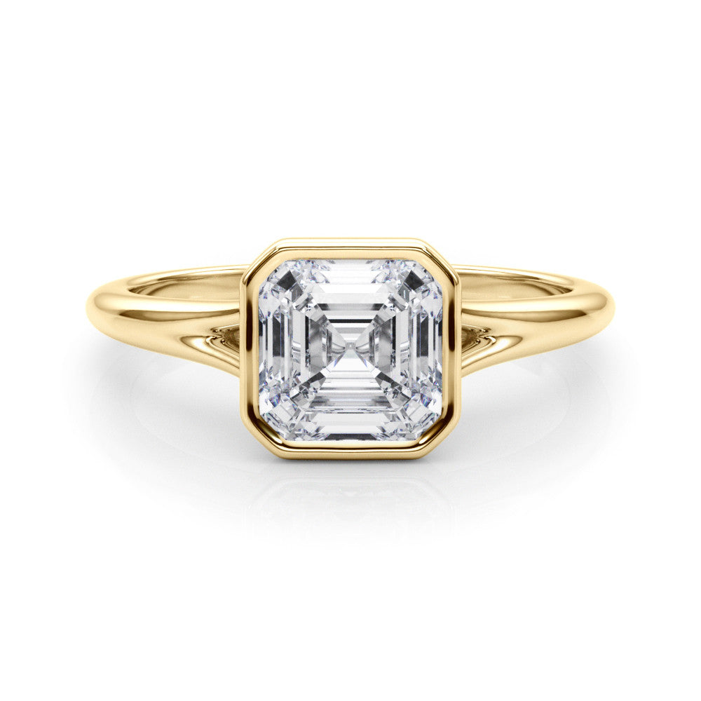 Yellow gold Bezel Set Pear Cut Solitaire Ring