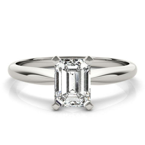White gold Round Cut Solitaire Ring with Four-Prong Setting on a Classic Band