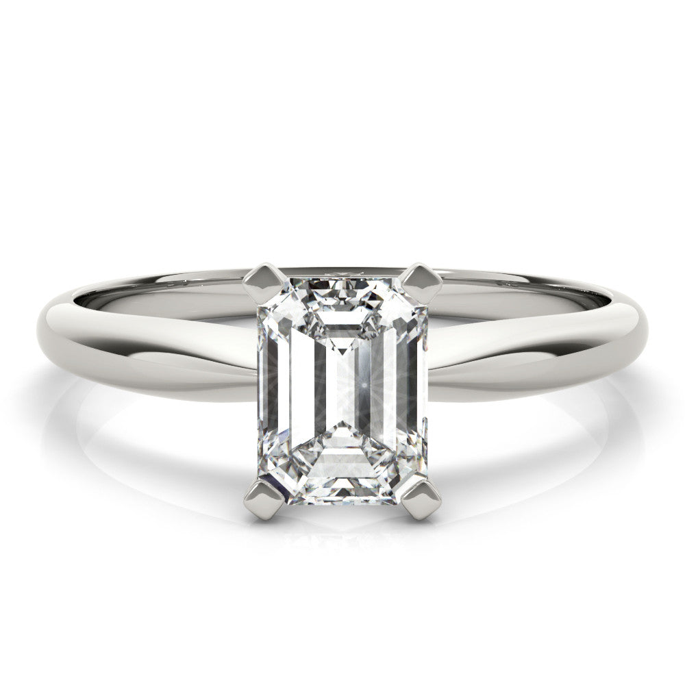 White gold Emerald Cut Solitaire Ring with Four-Prong Setting on a Classic Band