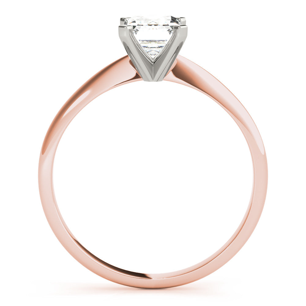 Rose gold Heart Cut Solitaire Ring with Four-Prong Setting on a Classic Band