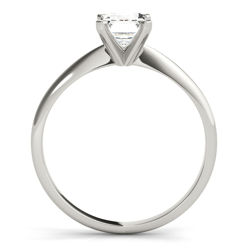 White gold Pear Cut Solitaire Ring with Four-Prong Setting on a Classic Band