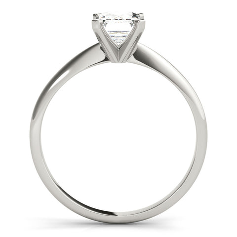 Silver Emerald Cut Solitaire Ring with Four-Prong Setting on a Classic Band