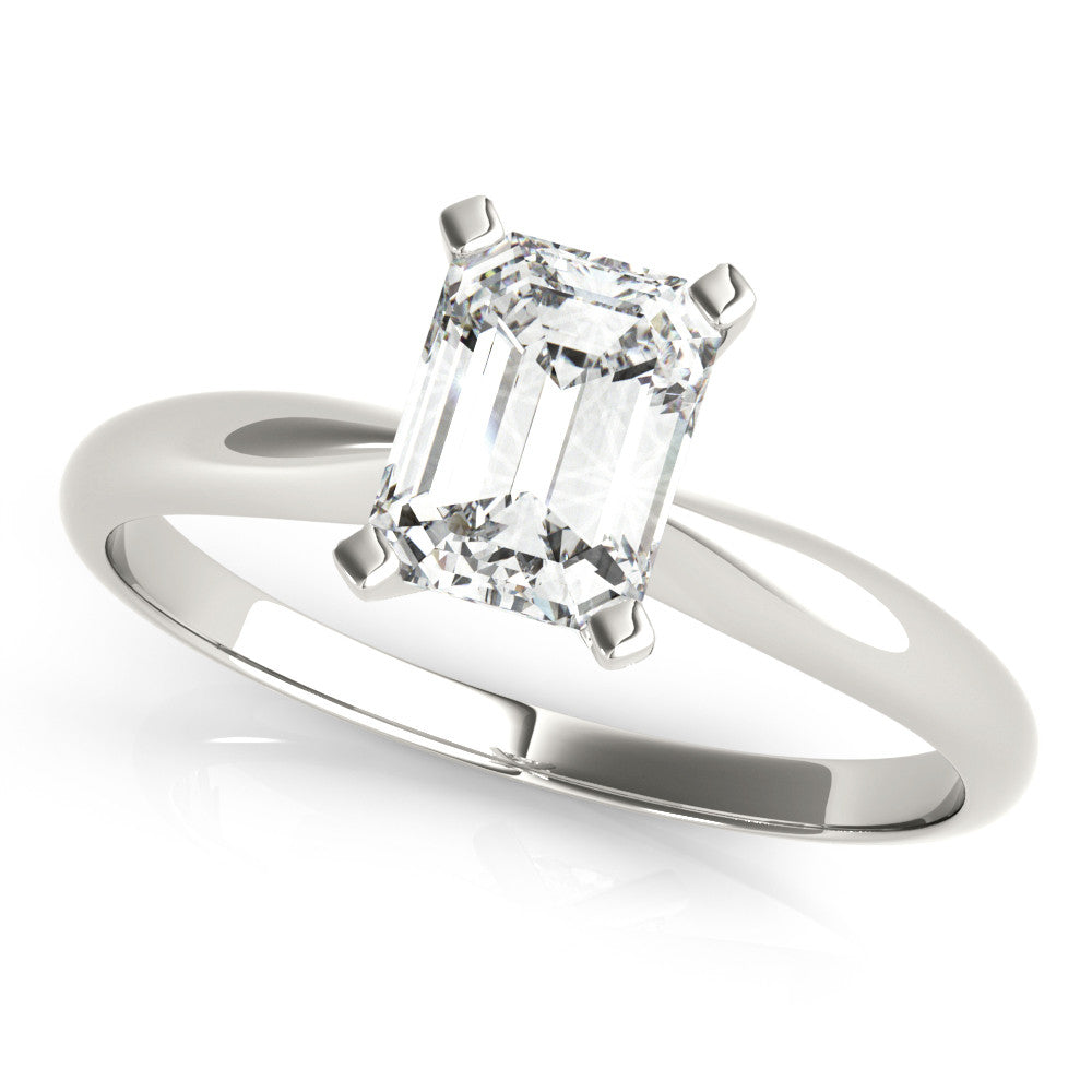 White gold Heart Cut Solitaire Ring with Four-Prong Setting on a Classic Band
