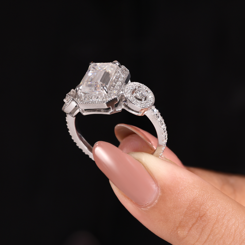 Silver Emerald Brilliant Three Stone Halo Engagement Ring With Vintage Milgrain Detail