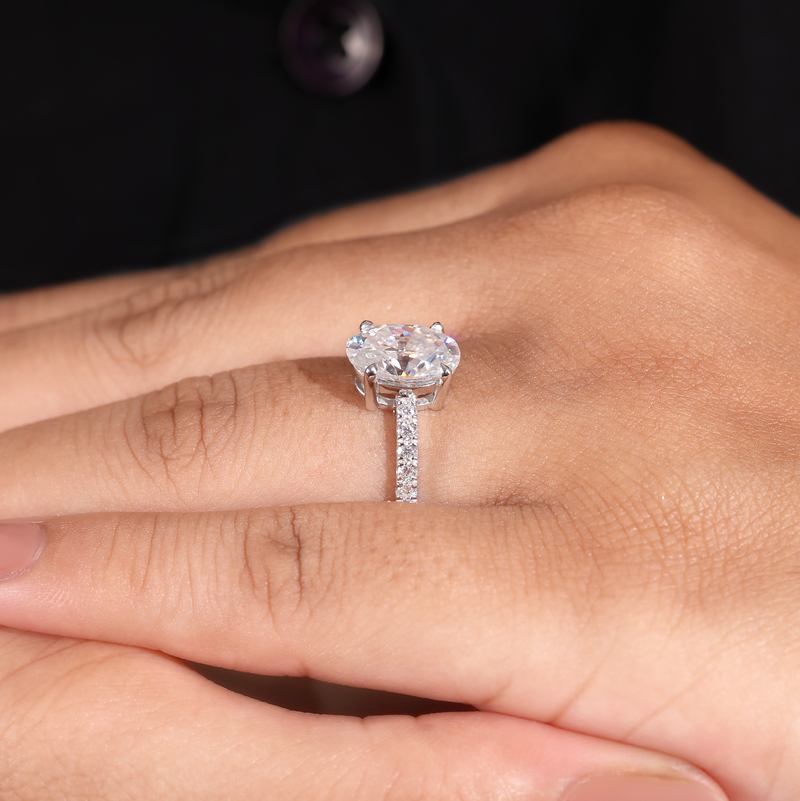 White Gold Oval Diamond Solitaire Engagement Ring With Graduated Pave Band