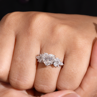 White Gold Heart Cut Engagement Ring With Marquise Diamond Floral Side Clusters And Pavé Band