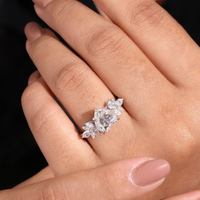 White Gold Heart Cut Engagement Ring With Marquise Diamond Floral Side Clusters And Pavé Band