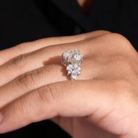 White Gold Heart Cut Engagement Ring With Marquise Diamond Floral Side Clusters And Pavé Band