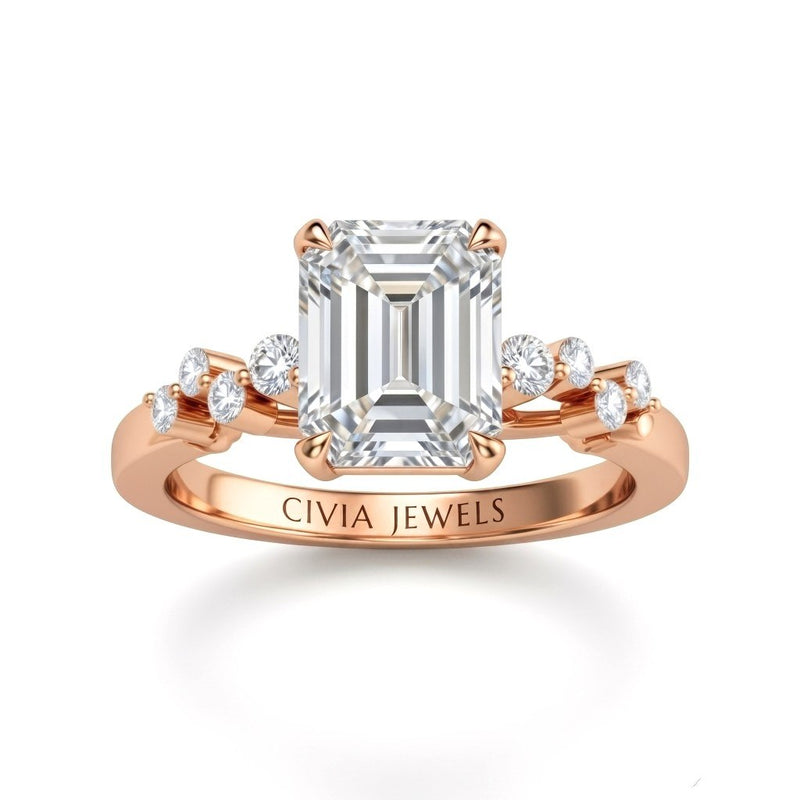 Rose Gold Emerald Cut Engagement Ring With Diamond Scatter Accent Shoulders And Classic Four-Prong Setting