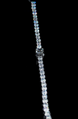 White gold Bezel-Set Round Diamond Tennis Bracelet with Radiant Center Diamond