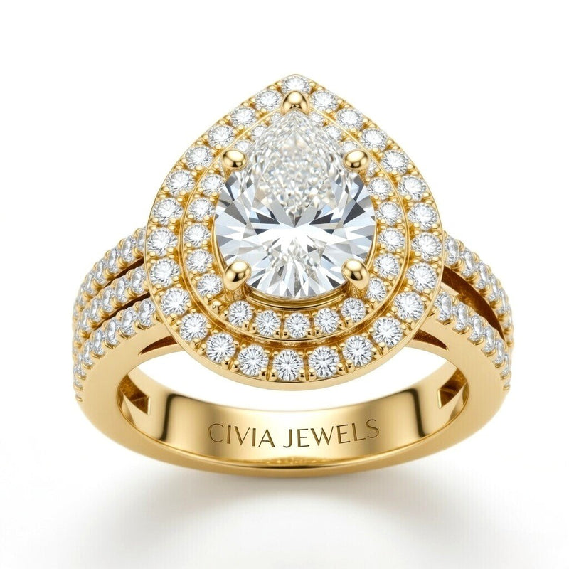 Yellow Gold Pear Cut Double Halo Engagement Ring With Four Prong Setting And Diamond Pavé Split Band