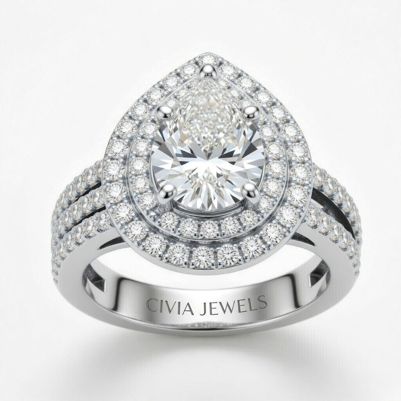 White Gold Pear Cut Double Halo Engagement Ring With Four Prong Setting And Diamond Pavé Split Band