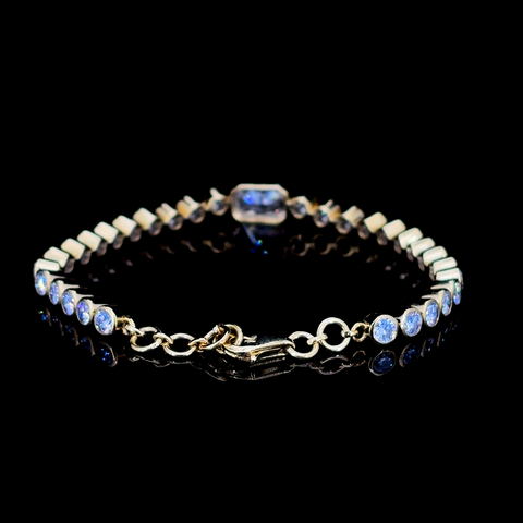 Yellow gold Bezel-Set Round Diamond Tennis Bracelet with Radiant Center Diamond