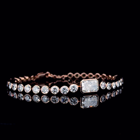 Rose gold Bezel-Set Round Diamond Tennis Bracelet with Radiant Center Diamond